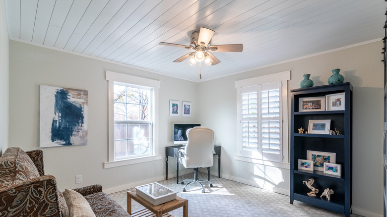 Home office with shiplap ceiling