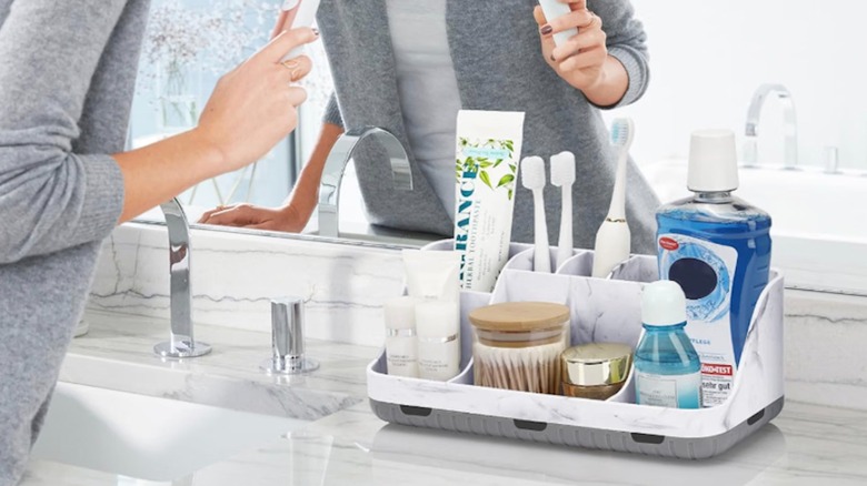 The GFWARE Marble Bathroom Countertop Organizer on a bathroom countertop.
