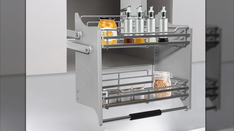 The HAPPCUCOE Pull Down Shelf extended from a kitchen cabinet