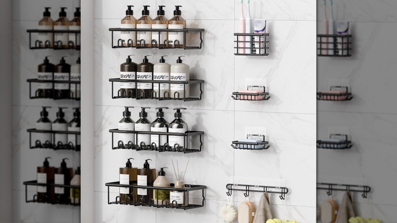 The 8 piece Zeawec caddies set up on a shower wall with shower products inside.