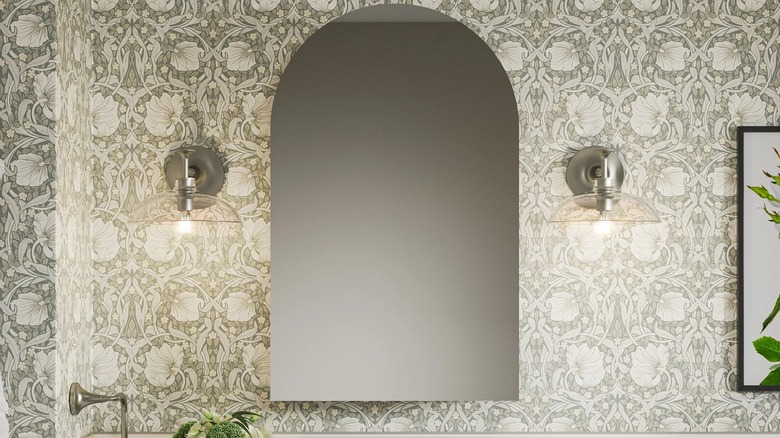 Arched mirror in a stylish bathroom