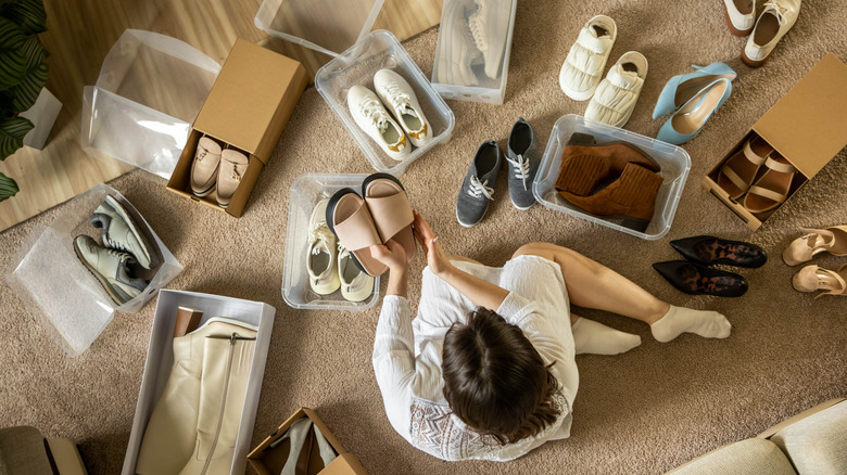 Shoes in a cabinet.