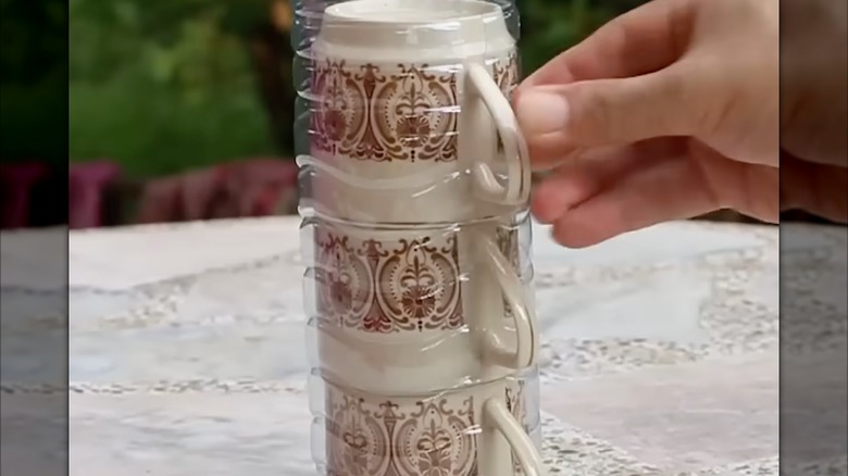 Coffee mugs in a bottle sleeve