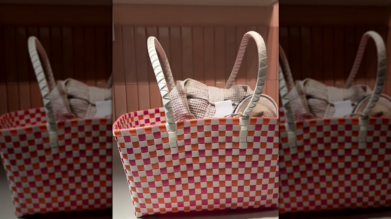 IKEA TOFSAND picnic basket holding bathrobe and slippers