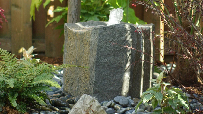 The Liquid Art Klamath Basin Birdbath-style 16" Bubbler Fountain in the yard