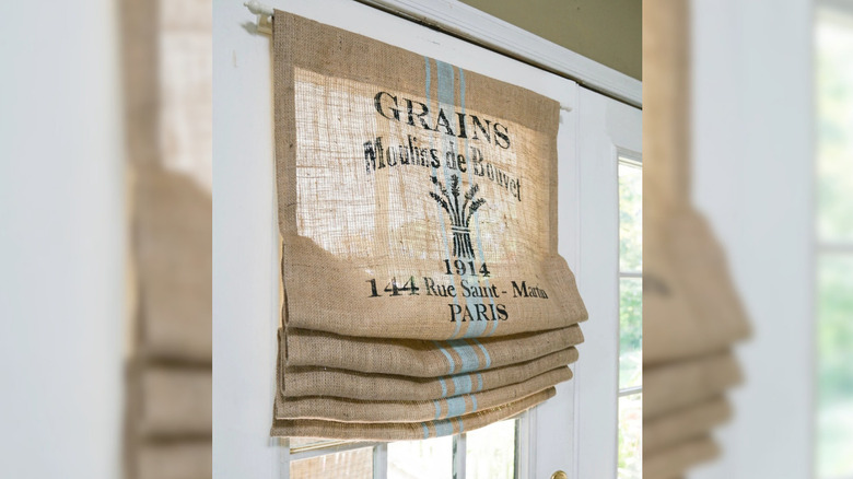 Rustic roman curtains made out of a flour sack