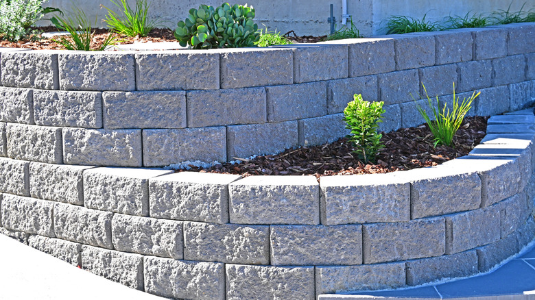 Concrete blocks arranged in a curved, staggered arrangement
