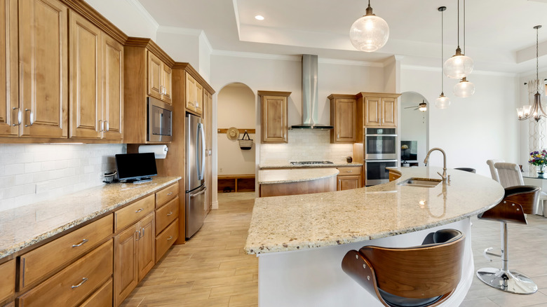 Kitchen with honey oak cabinets