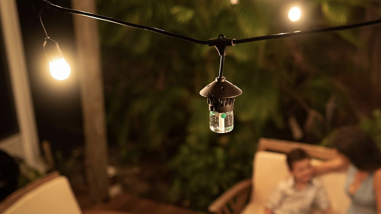 Tiki BiteFighter string lights on patio at night