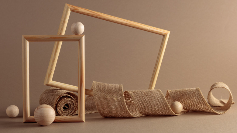 Burlap ribbon with wooden balls and frames