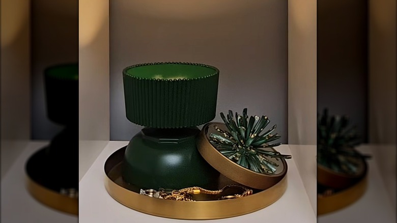 Dollar Tree bowls decorated and painted green become a lamp and a storage container.