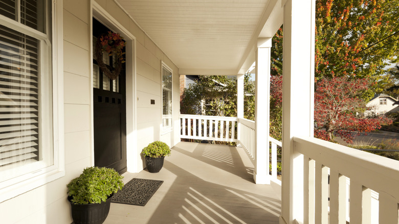 An attractive front porch with planters