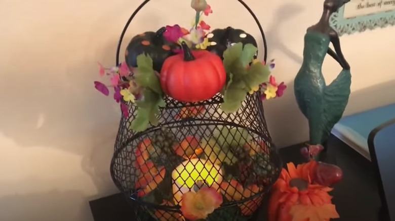 a fall centerpiece lantern made from Dollar Tree items