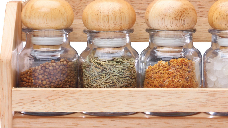 Spices on a wooden spice rack