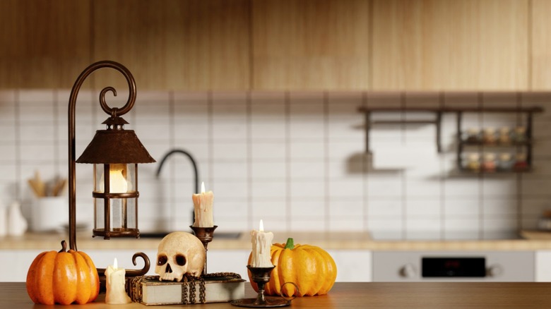 A kitchen counter decorated for Halloween