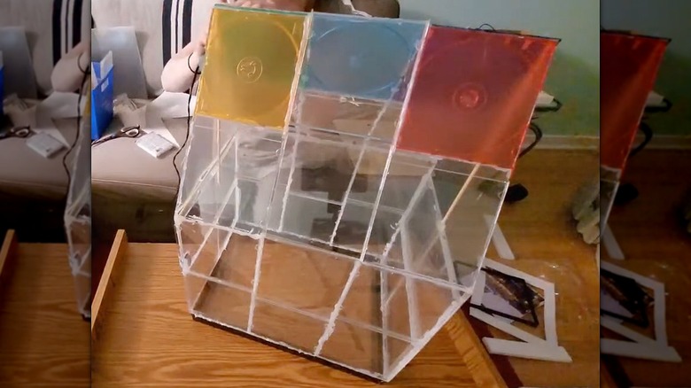 Clear mini greenhouse made from CD cases