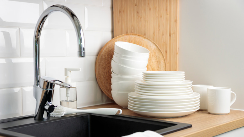 Faucet against a white backsplash