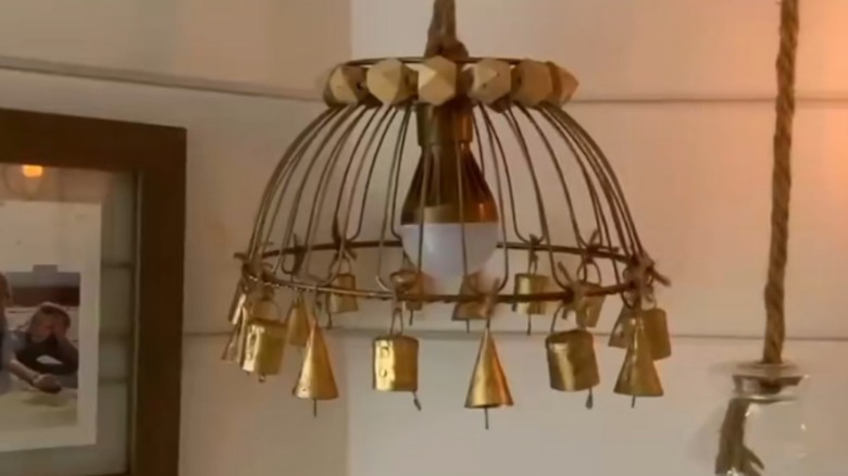 A painted and decorated fruit bowl being used as lighting feature