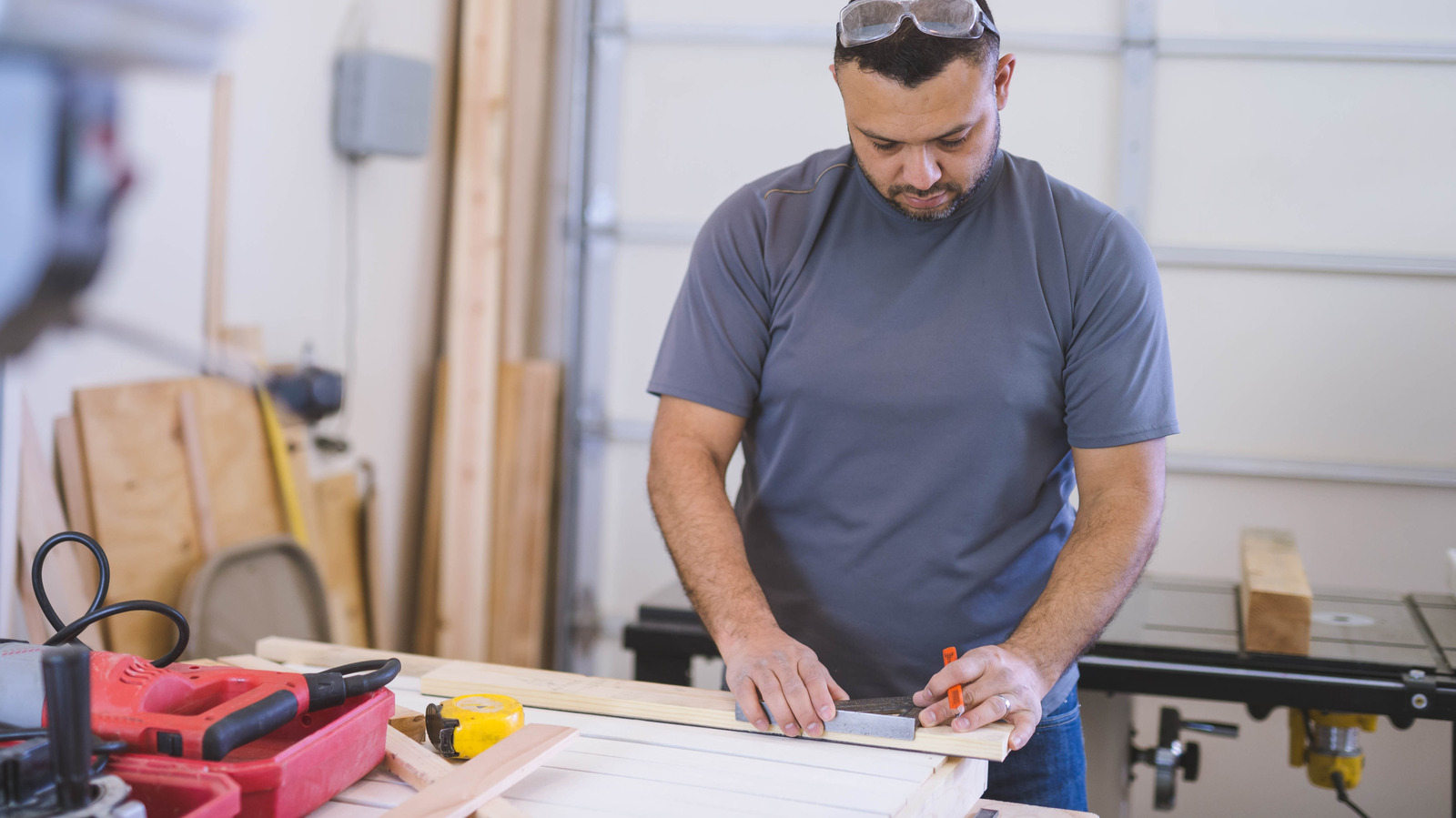 How To DIY A Swing-Out Garage Tool Wall And Lumber Storage Solution
