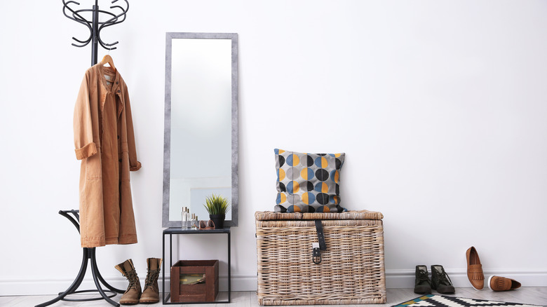 Coat rack with mirror and shoes