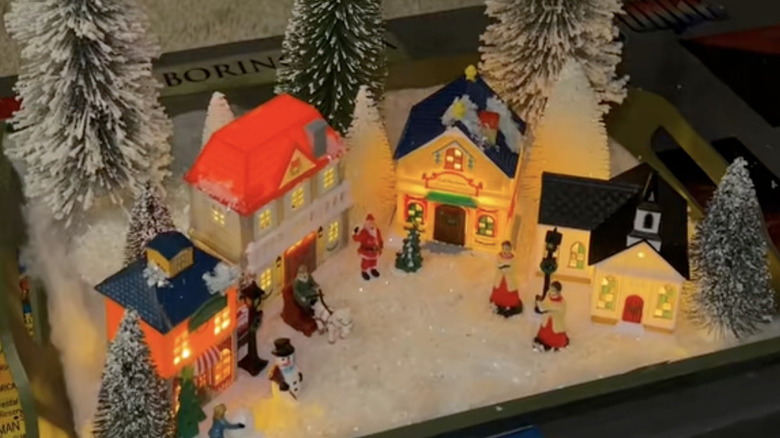DIY Christmas village created from Dollar Tree items.