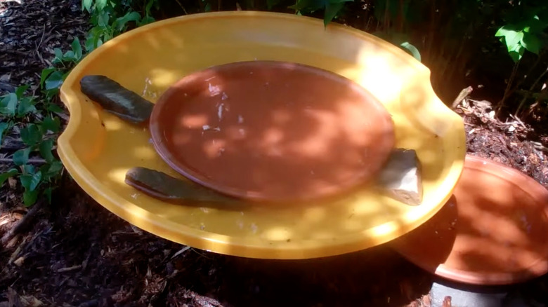 birdbath made from plastic sled