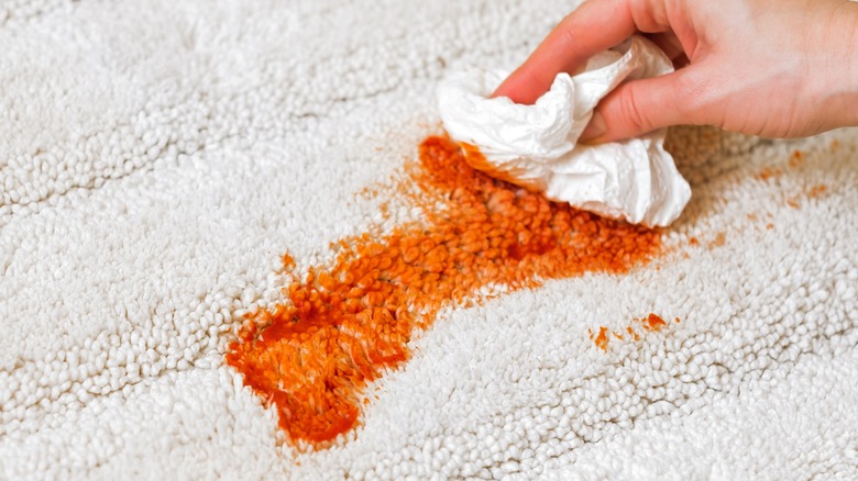 Orange stain on carpet