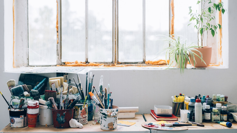 Art studio with art supplies on the table