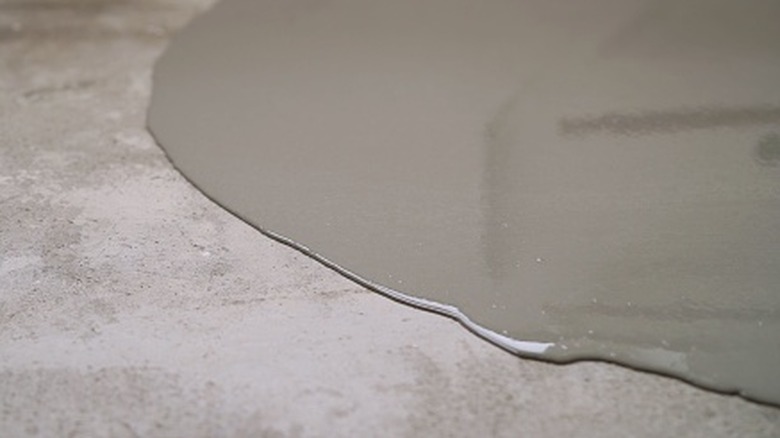 Self-leveling concrete poured over a floor