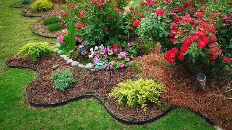 A colorful bed with plastic landscaping edging
