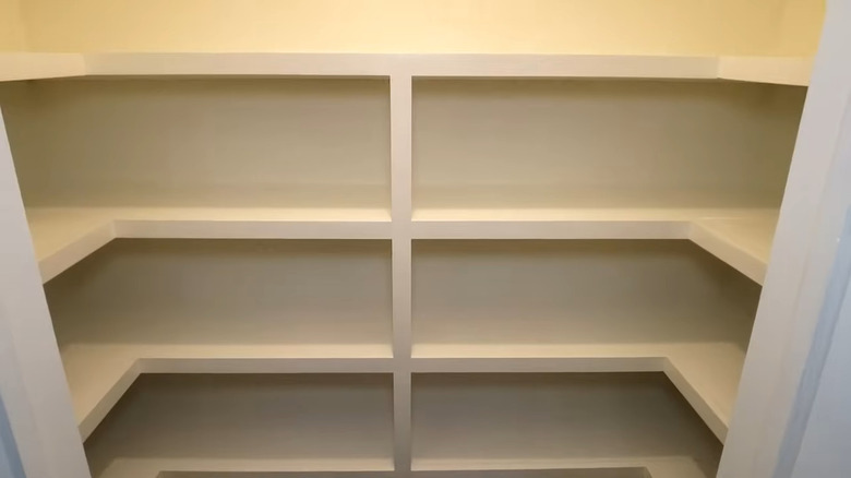 U-shaped or horseshoe shaped DIY shelving in a pantry closet