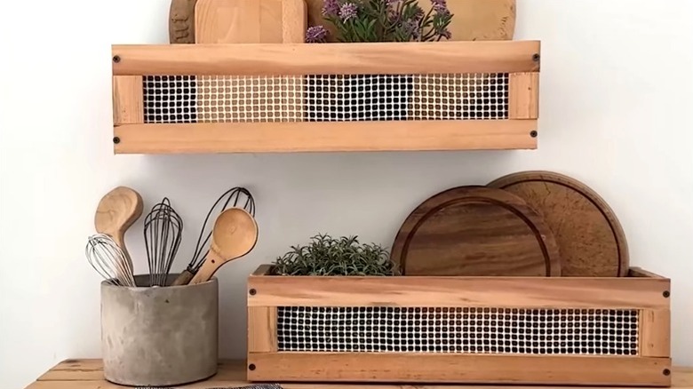 pair of DIY rustic kitchen shelves made from scrap wood and rug pad