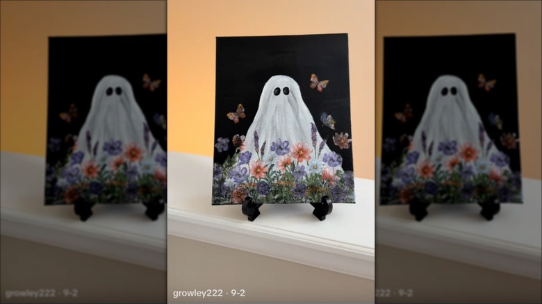 a pretty floral decoupaged ghost painting