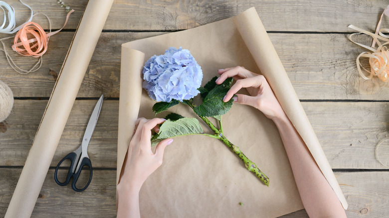 person crafting a hydrangea