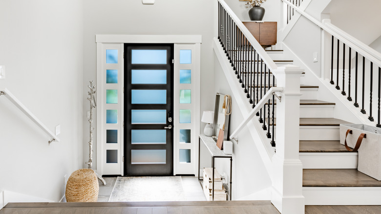 A stylish wood door with glass panels