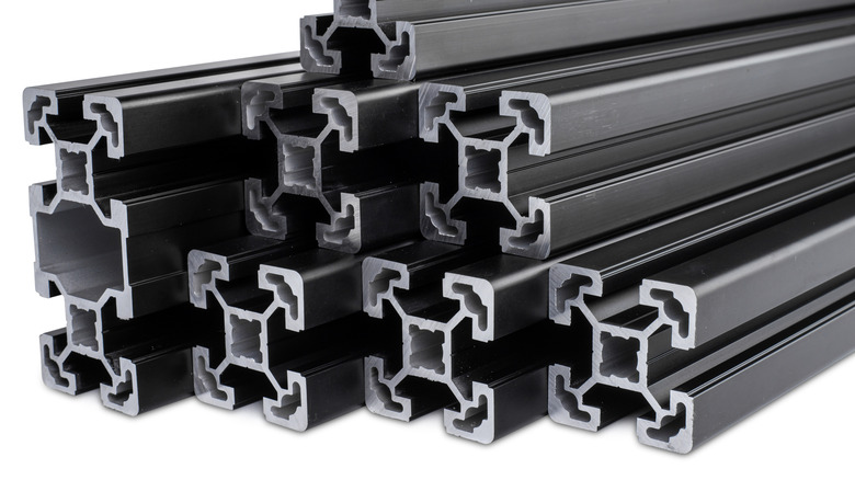 A stack of black aluminum extrusion profiles