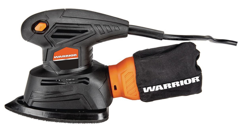 A close-up snap of a Warrior-branded palm sander against a white background.