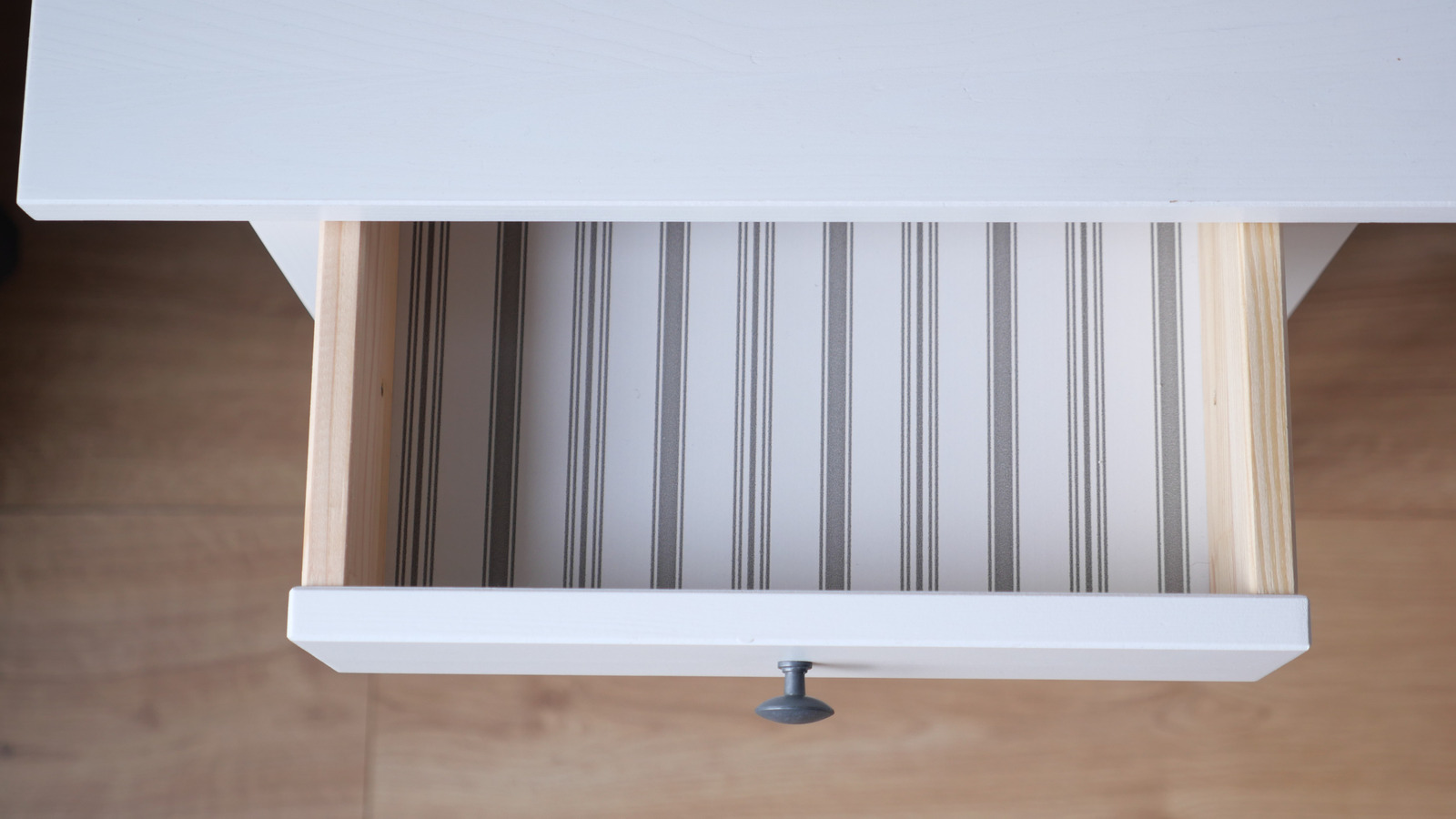 Do Adhesive Drawer Liners Enhance Value or Lead to Future Issues?