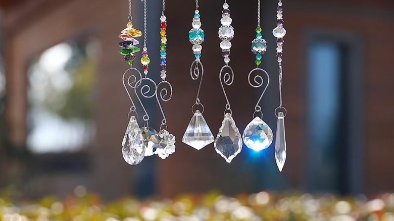 Crystal suncatchers in a garden