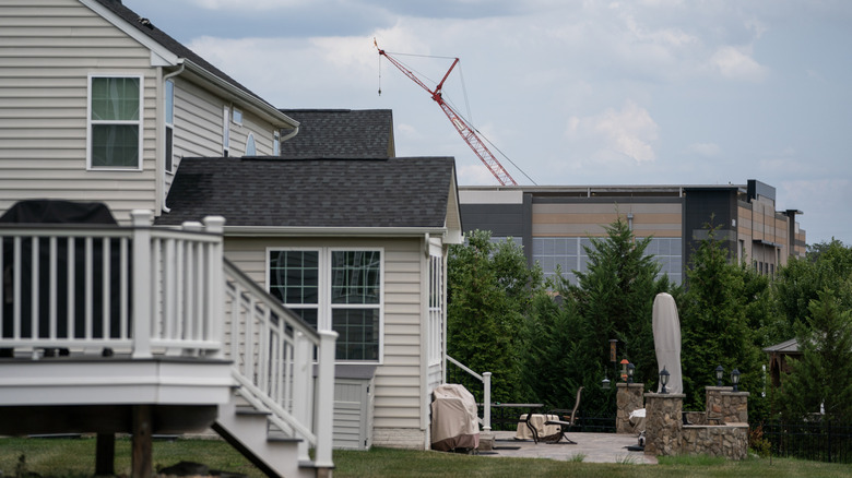 A data center is under construction behind a residential home