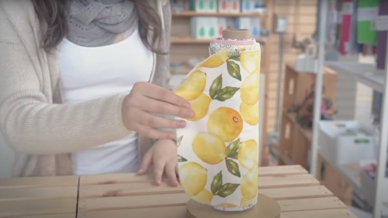 Person unwrapping washable paper towels