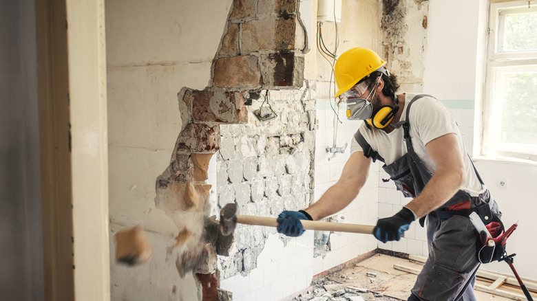 Man removing asbestos