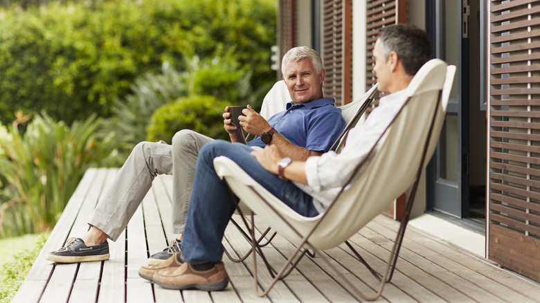 Men sitting on a porch