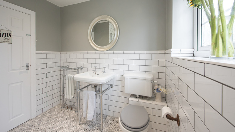 A modern bathroom design with multi-patterned tile.
