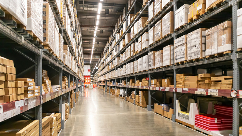 Image of IKEA aisle in the warehouse area, boxes of product on either end.