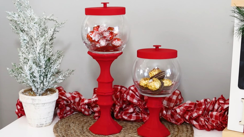 Two candy dishes made with Dollar Tree candle holders as the bases