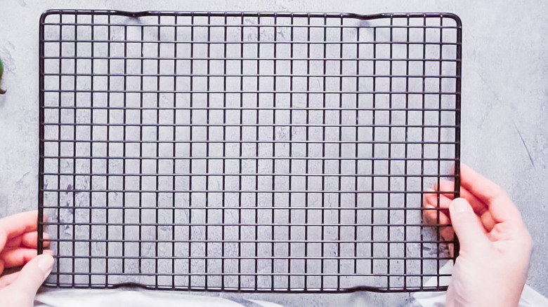 A vintage birdcage that contains decorative elements.