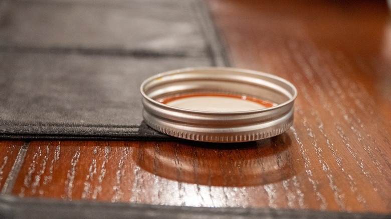 Mason jar lid on table