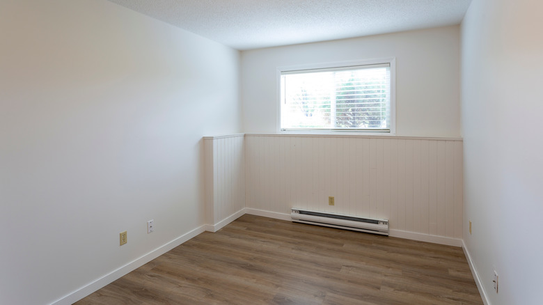 baseboard heater in apartment bedroom