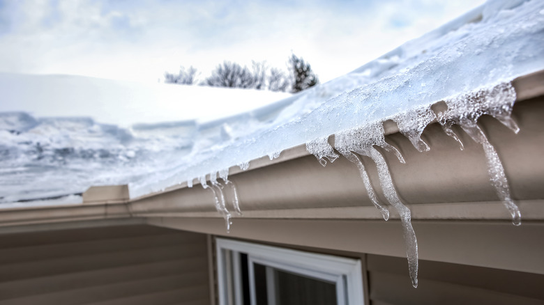 Ice dam on house roof